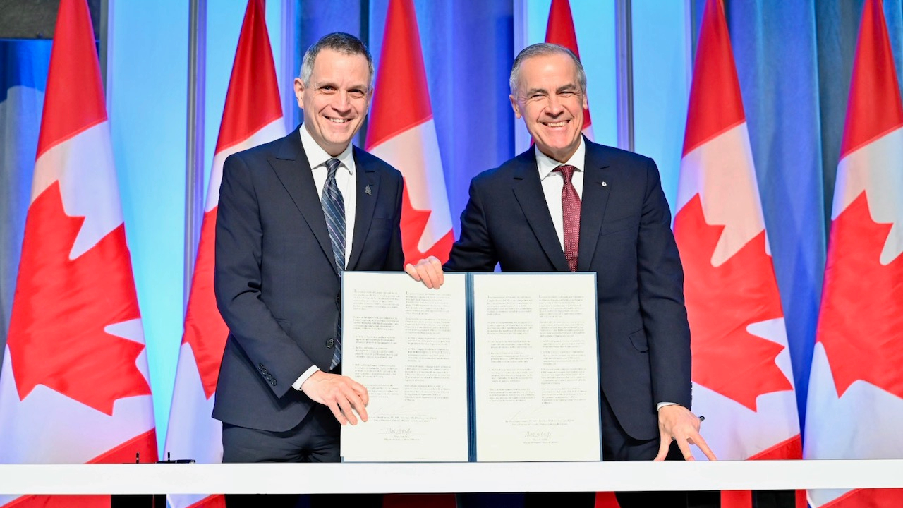 Mayor Mark Sutcliffe and Prime Minister Mark Carney announced a $400 million investment to fast-track affordable housing in Ottawa at the Mayor's Breakfast on Dec. 5. Photo by Mark Holleron.