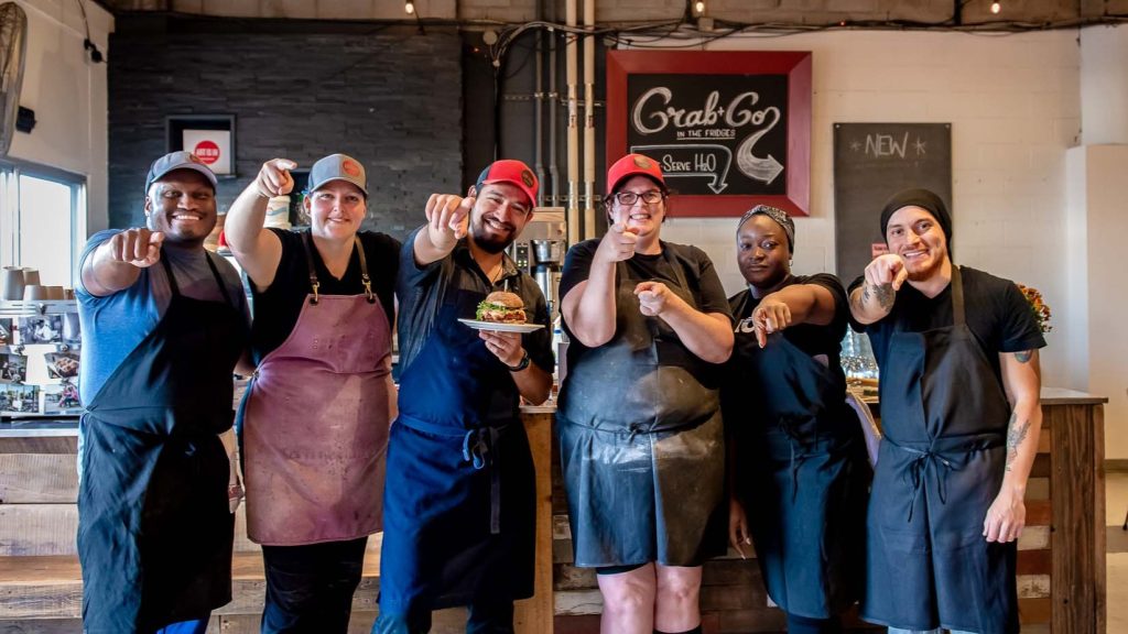 The team at Art-Is-In Bakery, which came out on top as the winner of the Ultimate Burger of the Year in the United Way Ultimate Burger Battle last month. Photo credit: United Way East Ontario