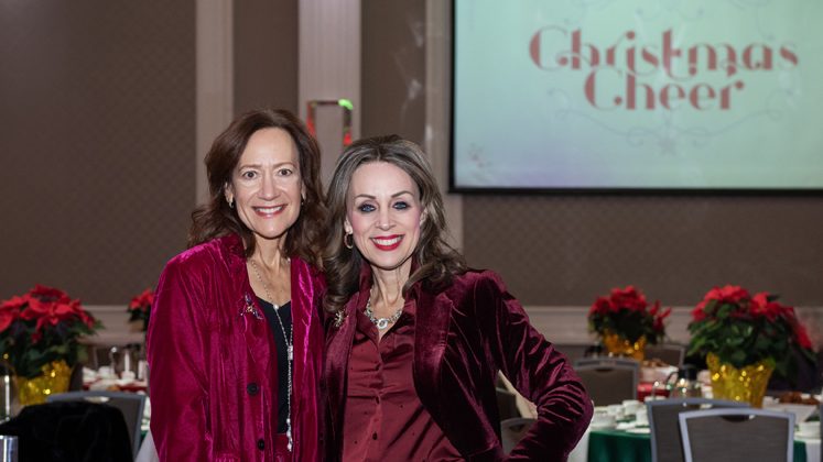 Ursula Gobel (IPAC) with Tammy Laverty-Hall (Royal LePage) at the Christmas Cheer Breakfast at the Infinity Centre, Dec 5, 2025. Photo by Tia MacPherson for OBJ.