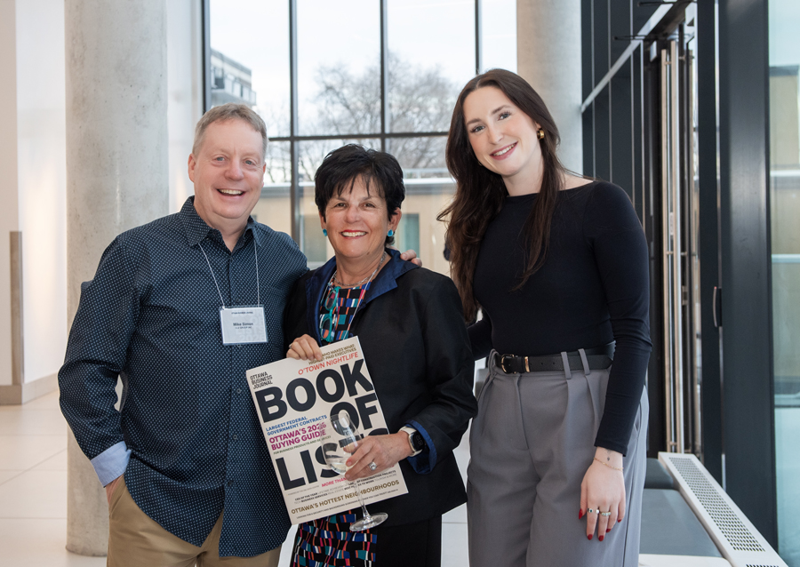 Mike Simon, Cheryl Kardish-Levitan and Erin McEvoy of CLV Group attend the Ottawa Business Journal annual Book of Lists Launch Party at the Ottawa Art Gallery on Feb. 26, 2026. Photo by Tia MacPherson for OBJ.