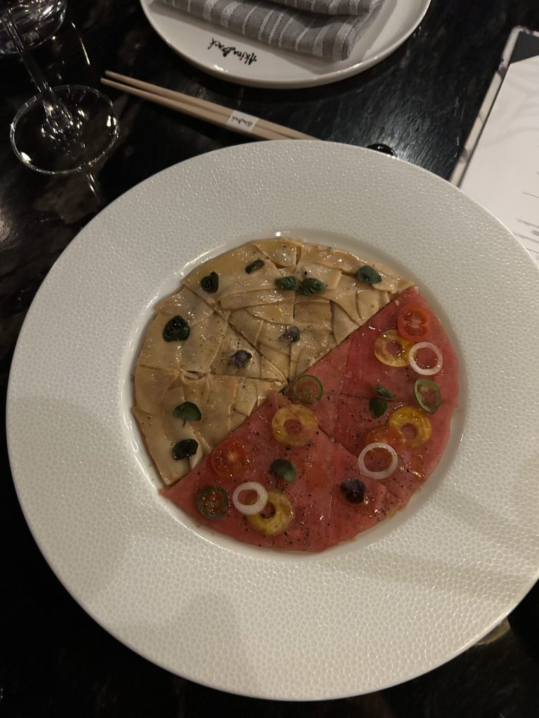 Raw tuna and eringi mushroom pizzas at Akira Back. Photo by Jordan Pizzuti.