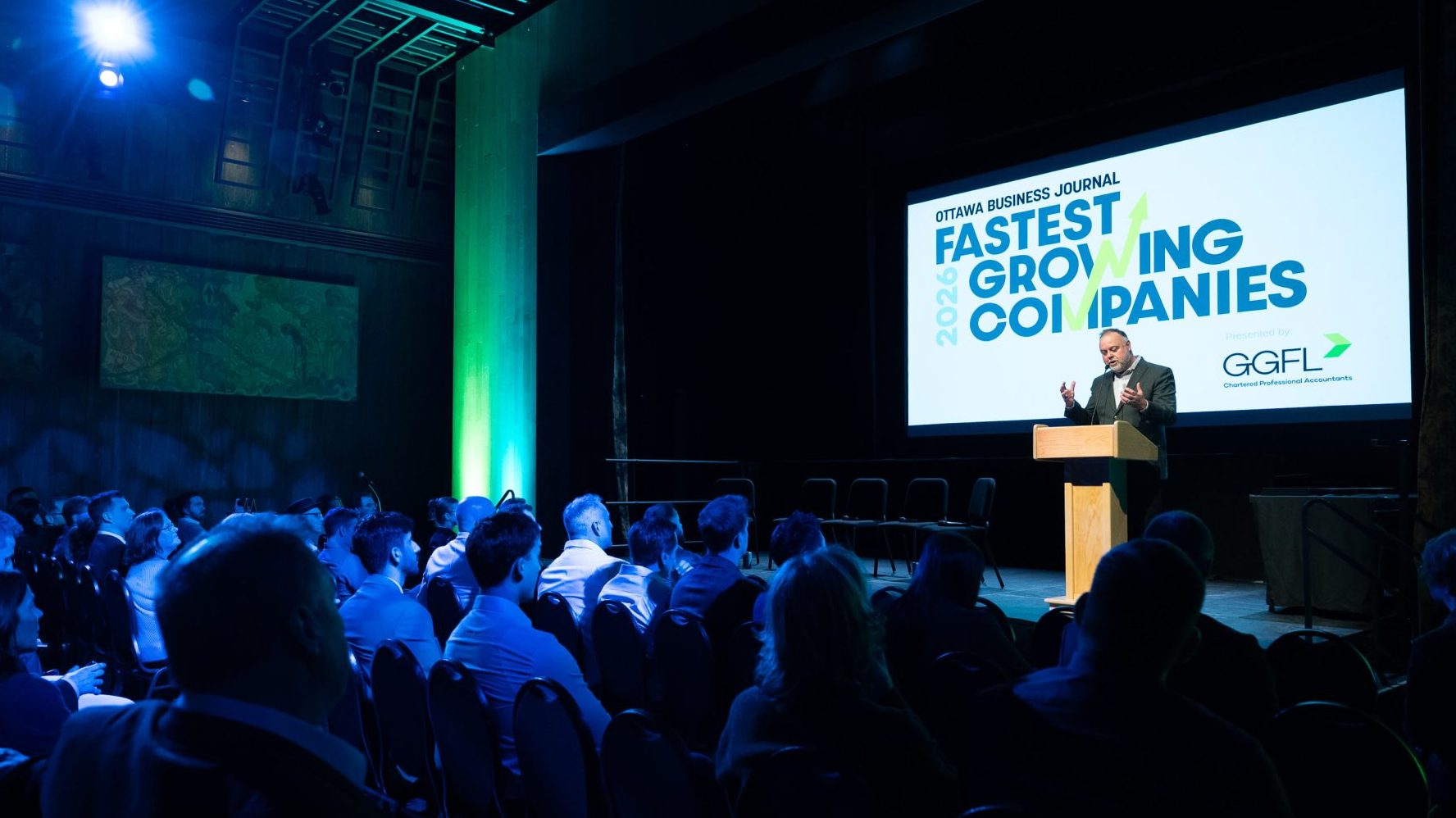 Michael Curran of Ottawa Business Journal speaking on stage at the 2026 Fastest Growing Companies event at the Canadian War Museum on Mar. 10, 2026. Photo by Mark Holleron for OBJ.