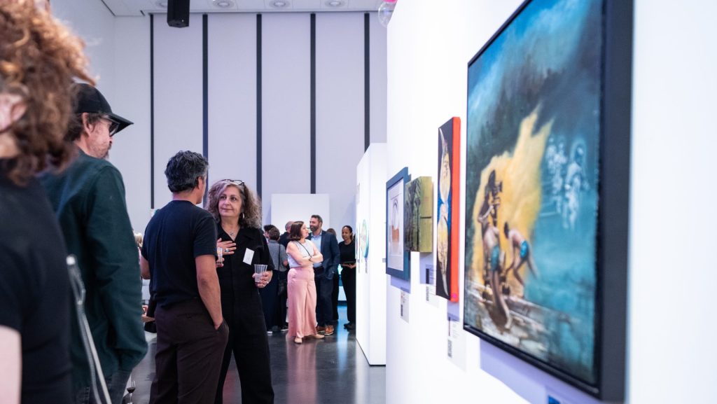 Guests view artwork during the Ottawa Art Gallery’s Give to Get Art Auction. Photo by Lindsay Ralph