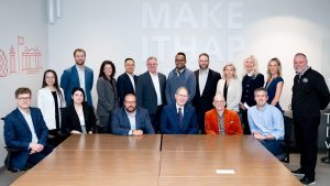 Local health innovation sector leaders gathered on Mar. 27, 2026 at Invest Ottawa for OBJ’s Executive Roundtable on Health Innovation. Back row (standing) left to right: Caroline Cao of University of Ottawa, Jeff Smirle of Capital Bioventures, Maura Campbell of Ontario Bioscience Innovation Organization, Eric Lee of Biotherapeutics Manufacturing Centre (OHRI), Ken Lawless of Carleton University, Anirudh Kumar of CarMa Institute, Ryan Philipe of the Ottawa Health and Life Sciences Innovation Hub, Rebecca Auer of Ottawa Hospital Research Institute, Nancy White of Calian Group Inc, Emily Jamieson of CHEO Foundation, and Michael Curran of Ottawa Business Journal. Front row (sitting) left to right: Derrick Gibbings of University of Ottawa, Kama Szereszewski of Momentum AIR, Jean-Simon Diallo of Virica Biotech, Rob Beanlands of uOttawa Heart Institute Foundation, Jason Berman of CHEO Research Institute, and Kyle Biggar of Nuvobio.