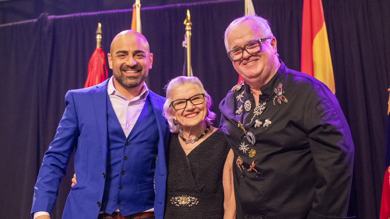 Co-MC Omar Dabaghi-Pacheco (CBC/Radio-Canada) with honorary chair Margaret Dickenson and Co-MC and Joseph Cull attend the Y Embassy Chef Showcase at Lansdowne Park, Ottawa, April 15, 2026. Photo by Tia MacPherson for OBJ.