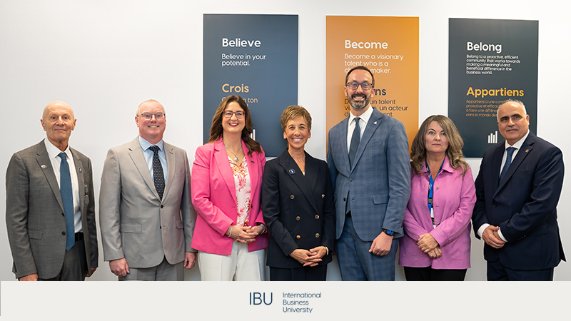 Dr. Alastair Summerlee (IBU Ottawa), Ken Doyle (Tech-Access Canada), Dr. Lynn Casimiro (Collège La Cité), Dr. Asima Vezina (IBU), Honourable Nolan Quinn (Ministry of Colleges, Universities, Research Excellence and Security), Kelly Daize (Kanata North Business Association), and MPP George Darouze (Carleton constituency) celebrating the grand opening of the International Business University Ottawa Campus, 979 Bank Street, Ottawa, April 30, 2026. Photo by Pat Laflamme.