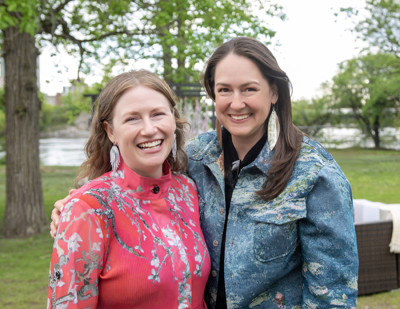 Laura Reinsborough (Riverkeeper and CEO, Ottawa Riverkeeper) and Tara-Leigh Mierins at the Ottawa Riverkeeper Gala on Lemieux Island, May 27, 2026. Photo by Tia MacPherson-Abdulla for OBJ.