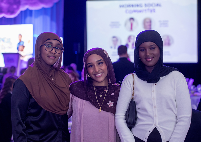 Isra Bakal (studying neuroscience and mental Health at Carleton University), Delaila Salem (co-host, studying childhood and youth studies at Carleton University, and founder of Sidelines with Delaila) and Muna Ahmed at the BCG Morning Social – Hopes and Dreams at the Taggart Parkes Family Clubhouse, May 14, 2026. Photo by Tia MacPherson-Abdulla for OBJ.