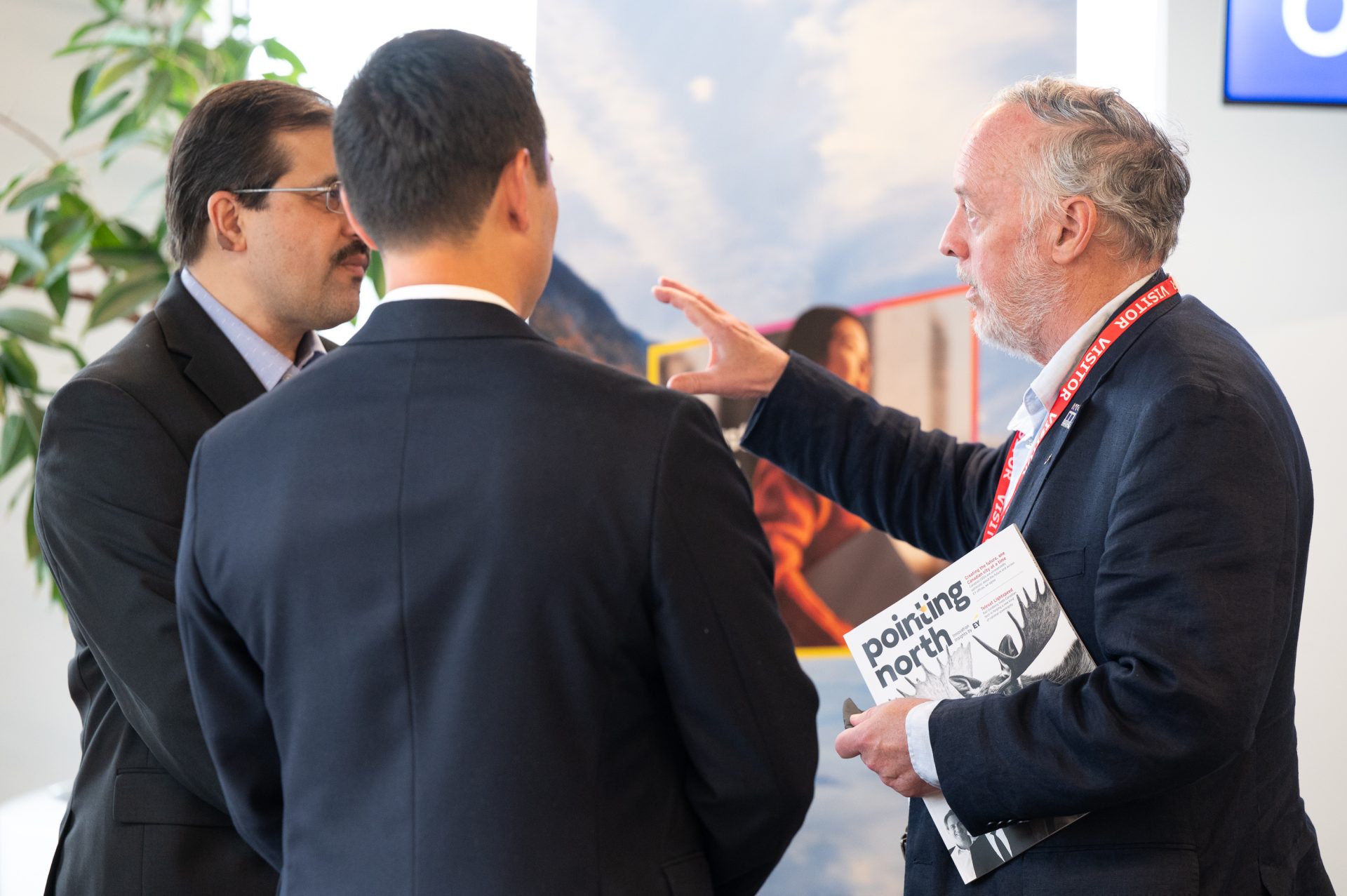 XYZ chatting with attendees at the executive dialogue on Ottawa’s economic future and innovation agenda at Telesat headquarters, 160 Elgin Street, Ottawa, May 26, 2026. Photo by Mark Holleran for OBJ.