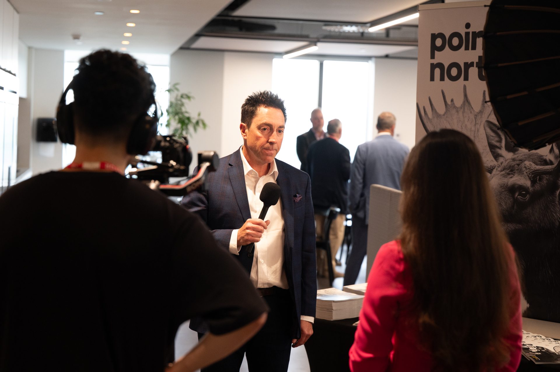 Jeff Johnson (EY Canada) being interviewed at the executive dialogue on Ottawa’s economic future and innovation agenda at Telesat headquarters, 160 Elgin Street, Ottawa, May 27, 2026. Photo by Mark Holleran for OBJ.