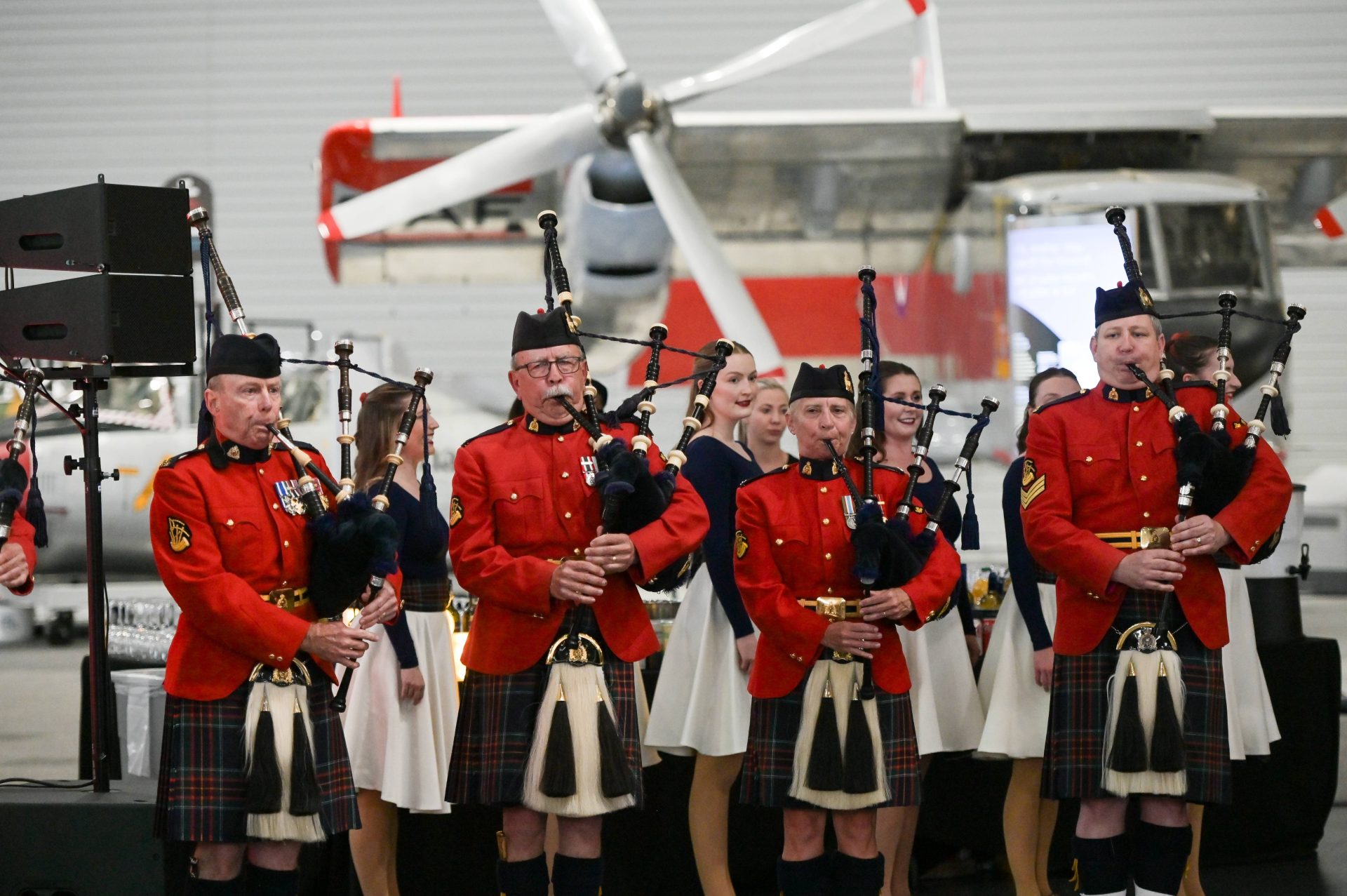 Members of the RCMP Pipes and Drums perform alongside dancers during the opening of the formal program at Veterans’ House Canada’s Andy Carswell Building 5th Anniversary celebration at the Canadian Aviation and Space Museum. Photo by James Park.