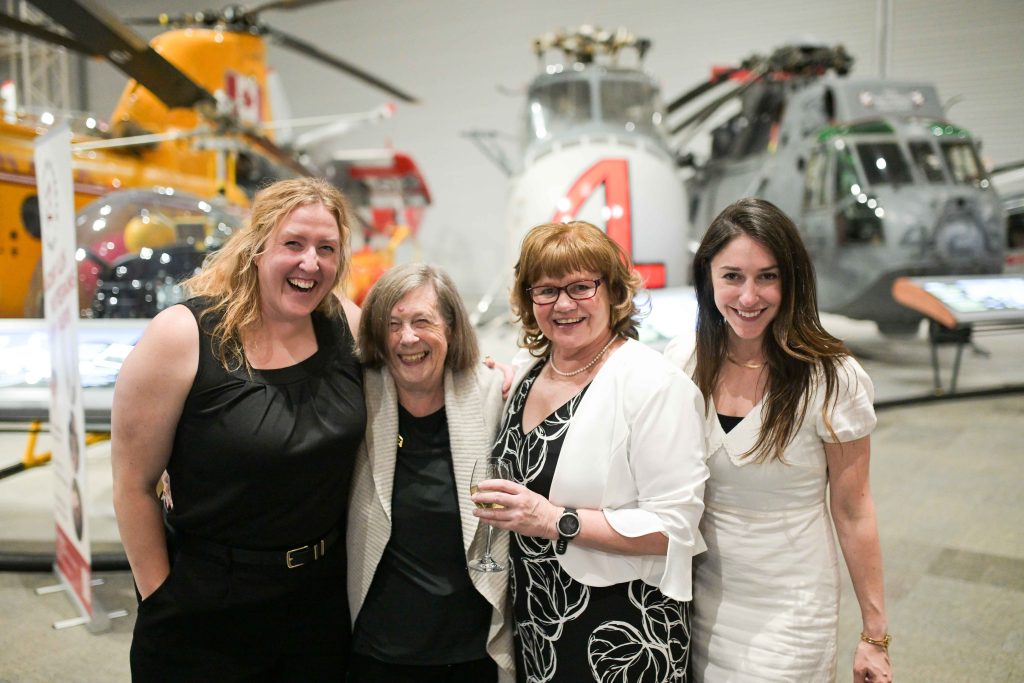 Left to right: Elizabeth Eldridge, Carol Raoult (VHC volunteer), Amanda Mulawyshyn (Event organizer), and Alyssa Gagne at Veterans’ House Canada’s Andy Carswell Building 5th Anniversary celebration at the Canadian Aviation and Space Museum. Photo by James Park.