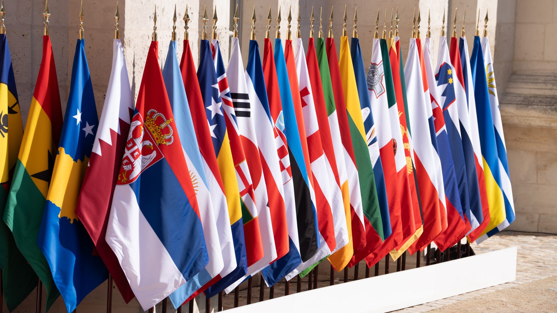 Member flags displayed at the 2024 Francophonie Summit in France. Photo credit: Cristian/Adobe Stock