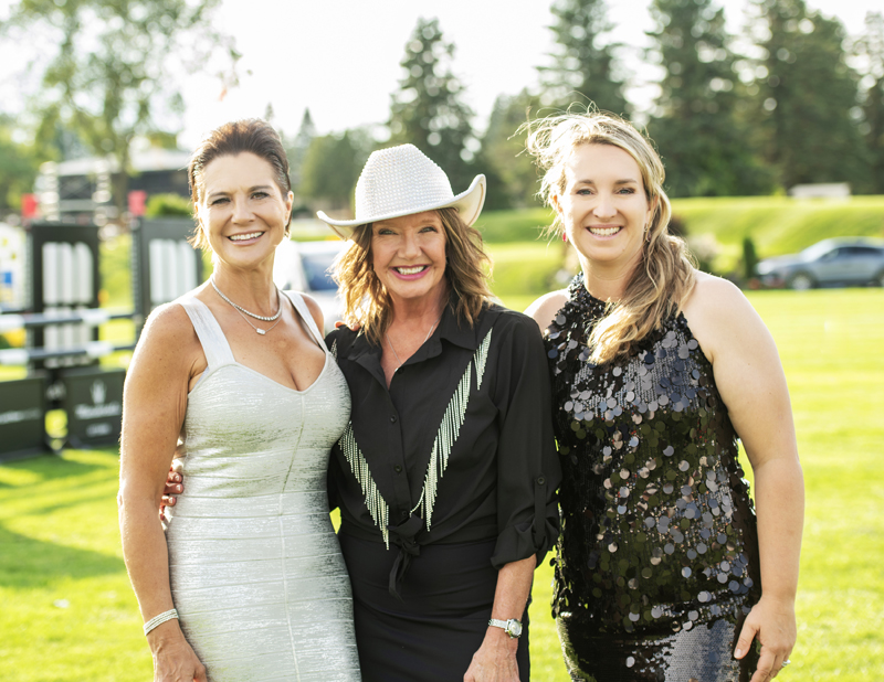 Event co-hair Catherine McLaughlin, Queensway Carleton Hospital Foundation's Shannon Gorman and event co-chair Karen Sparks at Spurs and Sparkles in support of Queensway Carleton Hospital at Wesley Clover Parks on Aug. 12, 2026. Photo by Tia MacPherson-Abdulla/OBJ.
