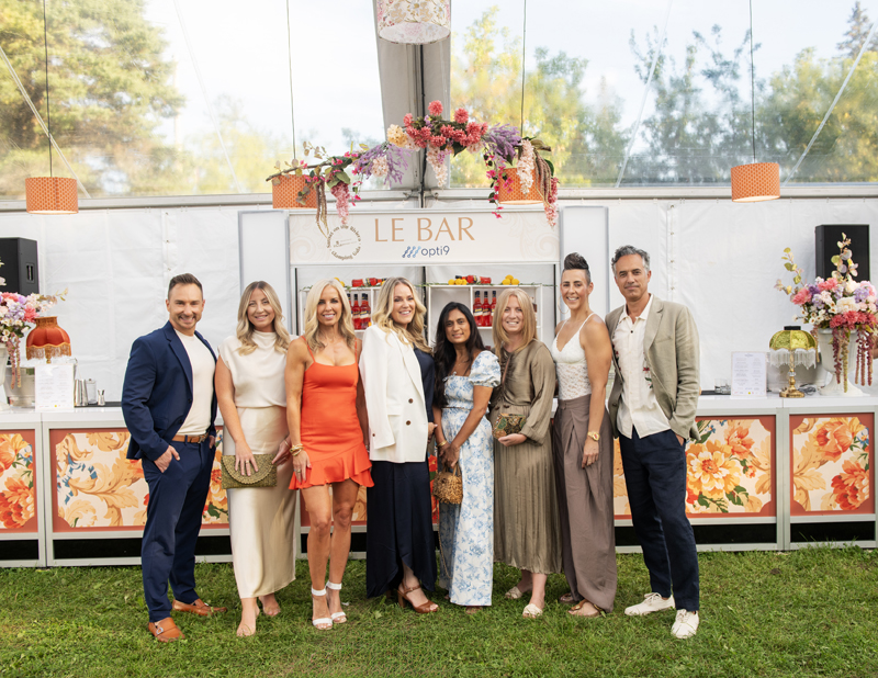 Ottawa gala committee members (L-R) Dr. Sam Hetz, Shannon Holbrook, Sarah Grand, Marcie Murray, Monica Singhal, Jamie Petten, Kristen Cannon and Christopher Schlesak at the Sunset on the Riviera Glamping Gala in support of the Ottawa Boys and Girls Club, Sept. 3, 2026. Photos by Tia MacPherson-Abdulla/OBJ.